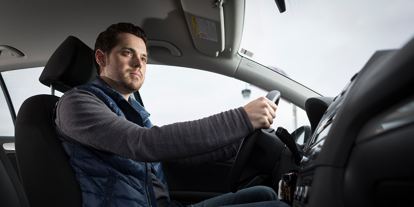 Man driving car